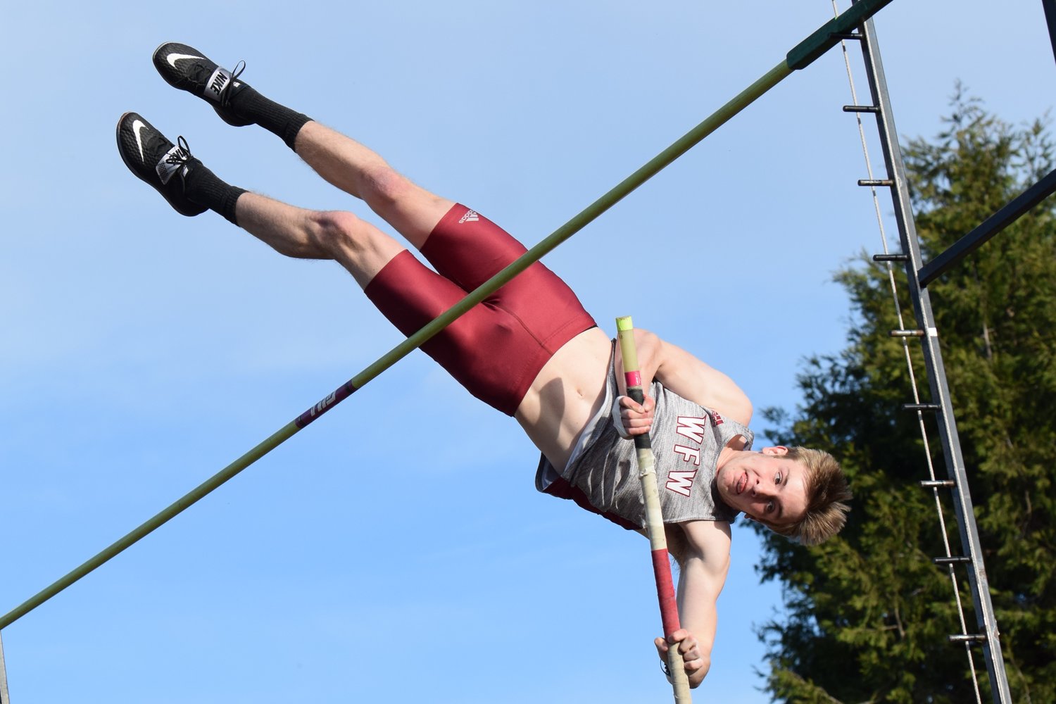 W.F. West's Lucas Hoff leaps over the pole vault bar at a meet in Tumwater March 29.